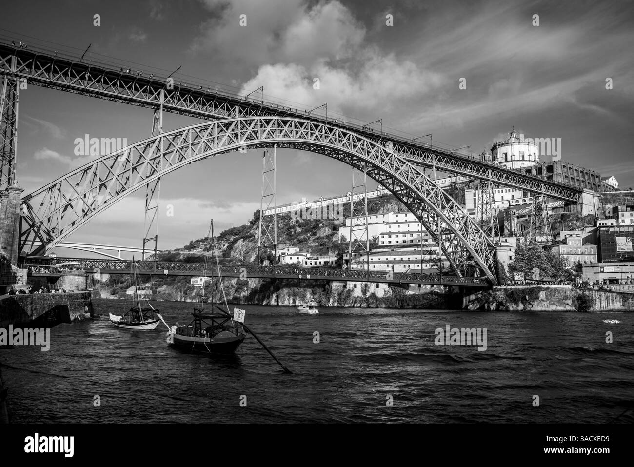 Architectural detail of iconic arched iron bridge Ponte Luis I in the Porto city center, Portugal Stock Photo