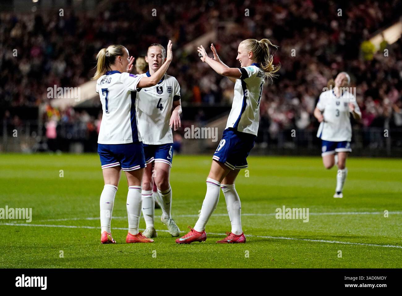 England's Aggie Beever-Jones (right) celebrates with team-mates after ...