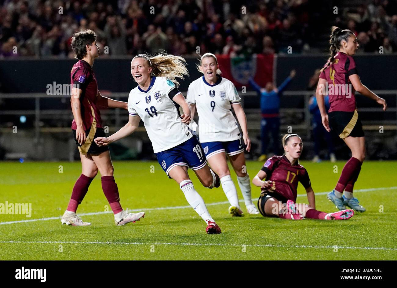 England's Aggie Beever-Jones celebrates scoring their side's third goal ...