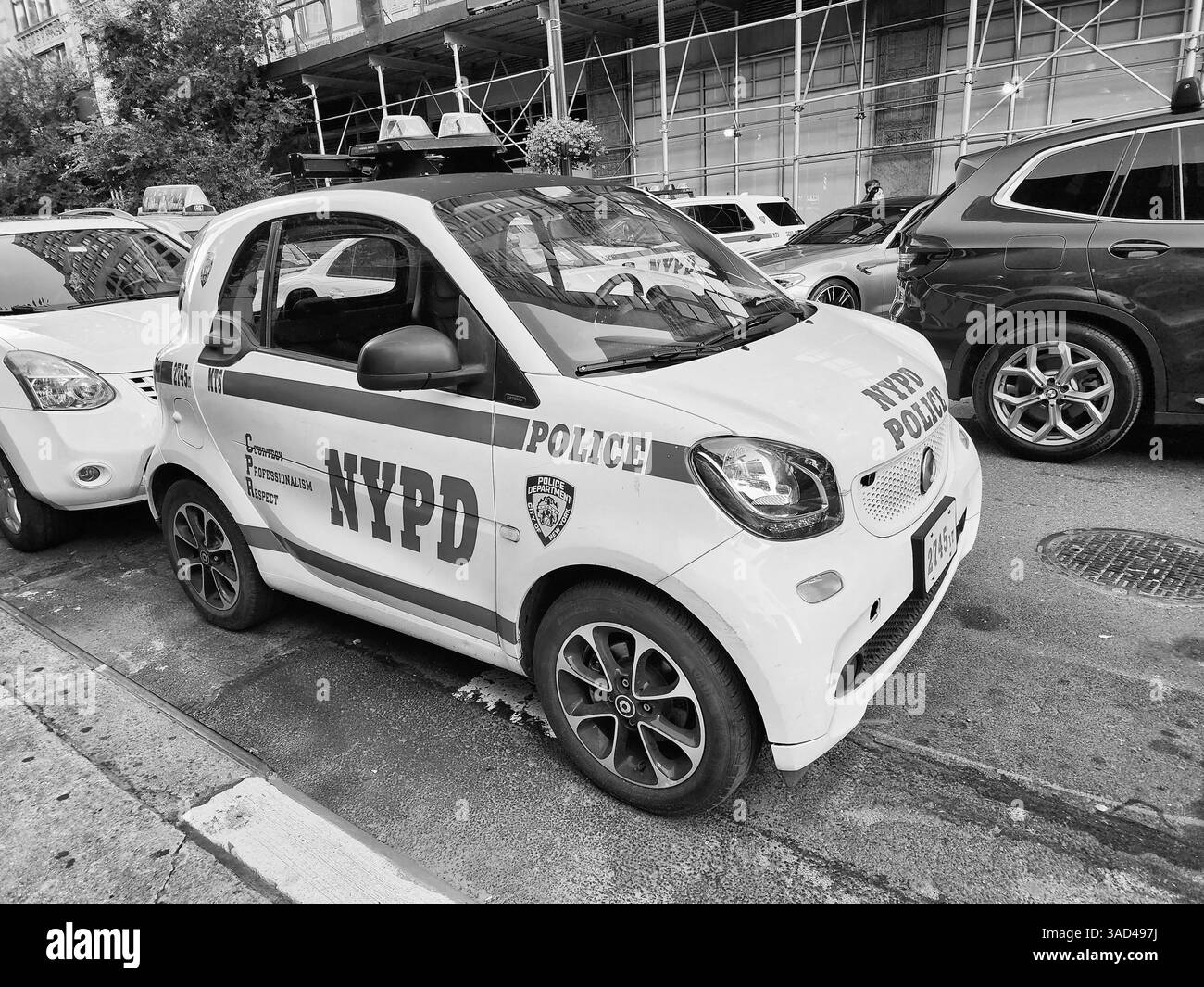 New York City, USA - August 13, 2023: NYPD police car Smart City Coupe, side view Stock Photo