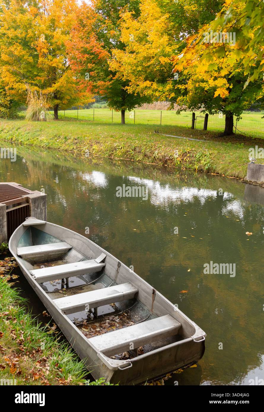Rowboat on river at Miller's Cider Mill in Amish Country in Middlebury, northern Indiana Stock Photo