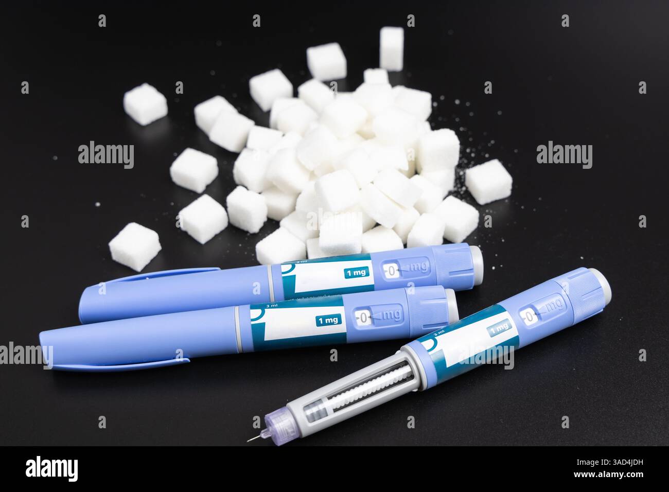 Insulin injection pens measuring hi-res stock photography and images ...