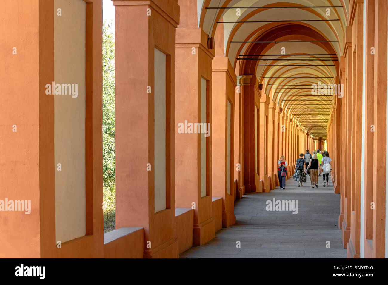 People walking along The Portico di San Luca in Bologna which stretches 3.8Km , the longest covered walkway in the world, Bologna,Italy Stock Photo