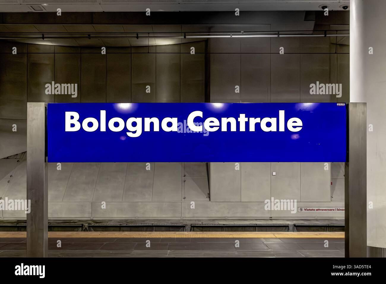 A blue Bologna Centrale station sign on the lower underground level of Bologna Centrale train station in Bologna ,Italy Stock Photo