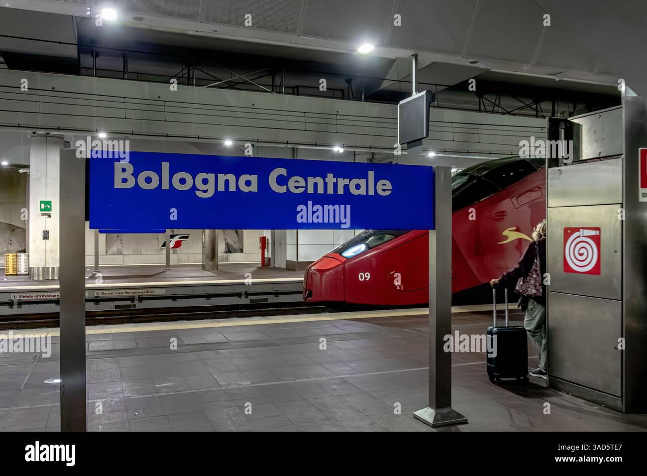 An Italo high speed train waits at Bologna Centrale railway station in hte lower underground level of Bologna Centrale train station in Bologna ,Italy Stock Photo