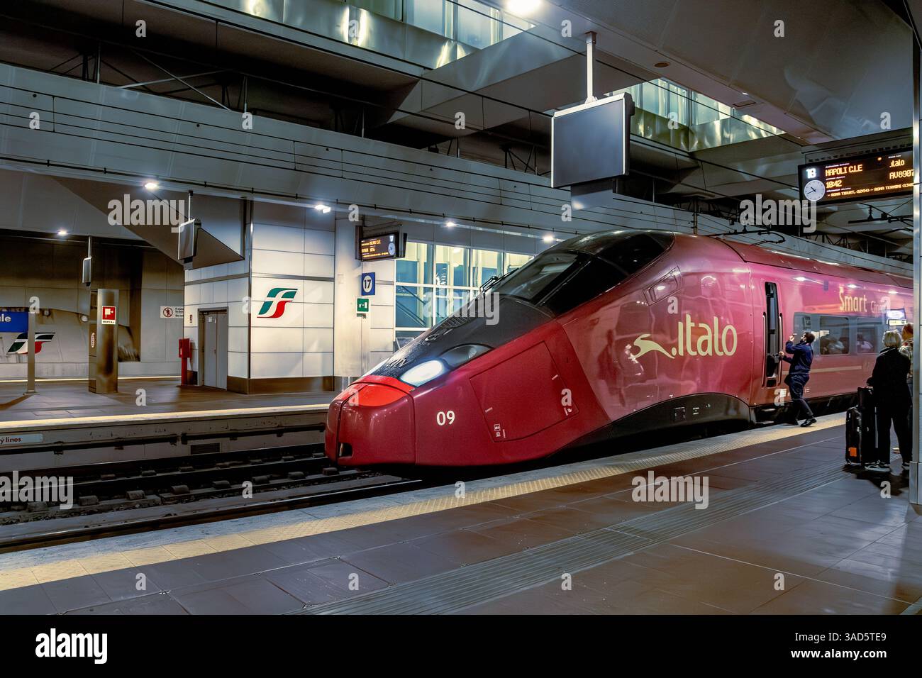 An Italo high speed train waiting to depart from platform 18 on the lower underground level of Bologna Centrale train station in Bologna,Italy Stock Photo