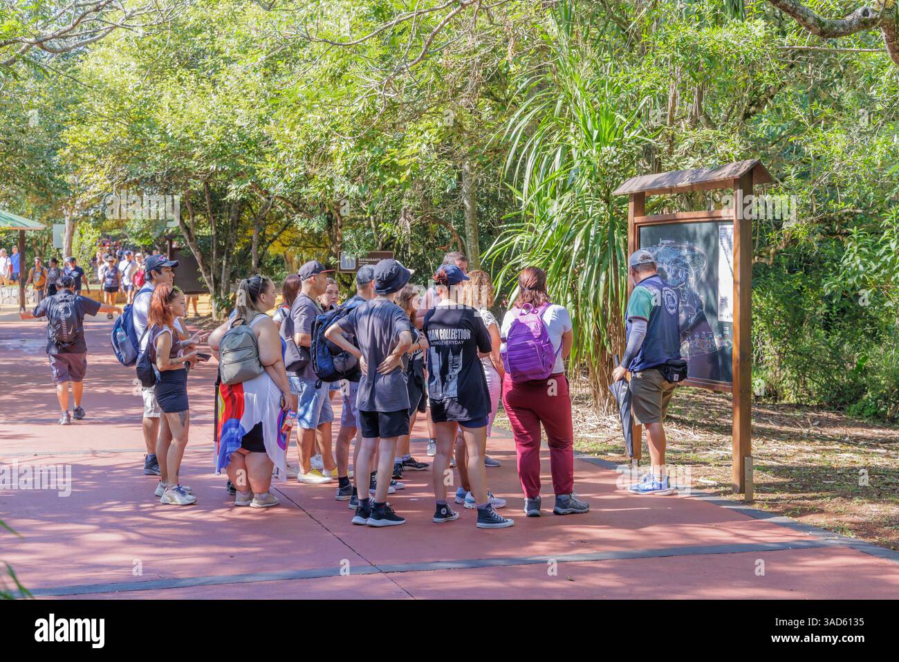 Puerto Iguazu, Misiones, Argentina - April 2nd, 2025: Tourists in Iguazu National Park. Stock Photo