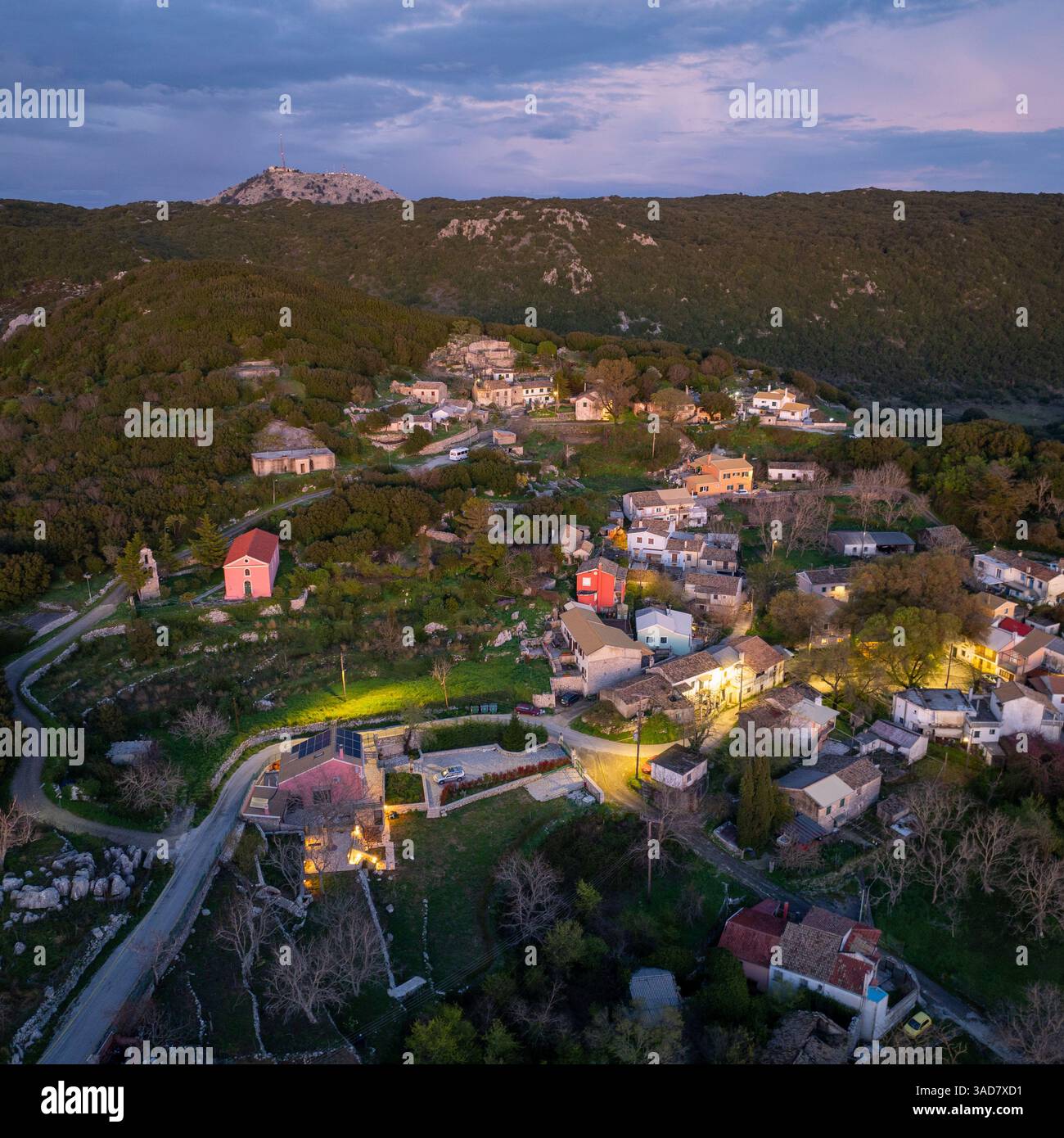 Aerial view showcasing a charming village nestled amidst lush greenery ...