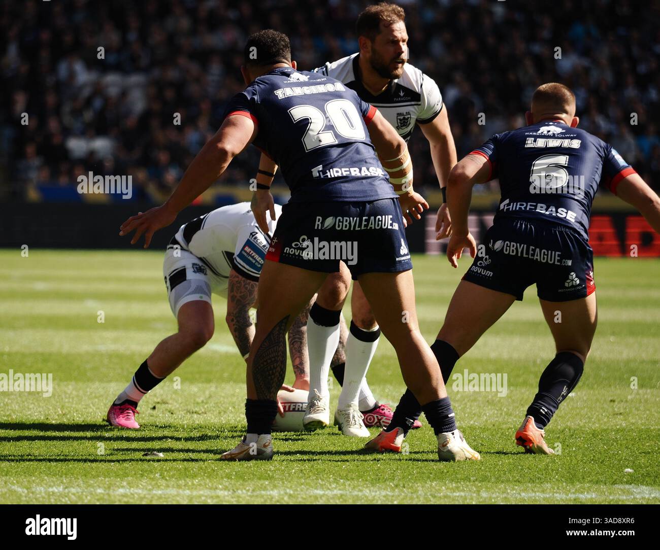 Tanginoa Kelepi Tanginoa of Hull KR and Mikey Lewis of Hull KR try to prevent a ...
