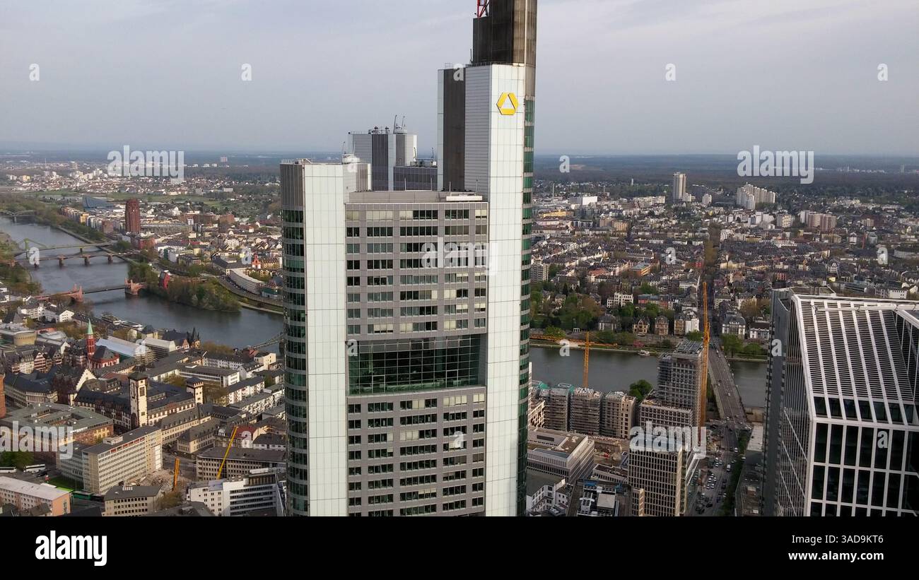 Aerial view of a modern city skyline featuring tall buildings and a ...