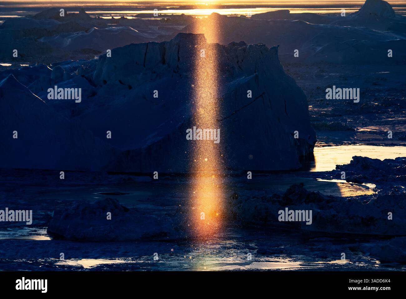 A stunning landscape featuring ice formations and a beam of light ...