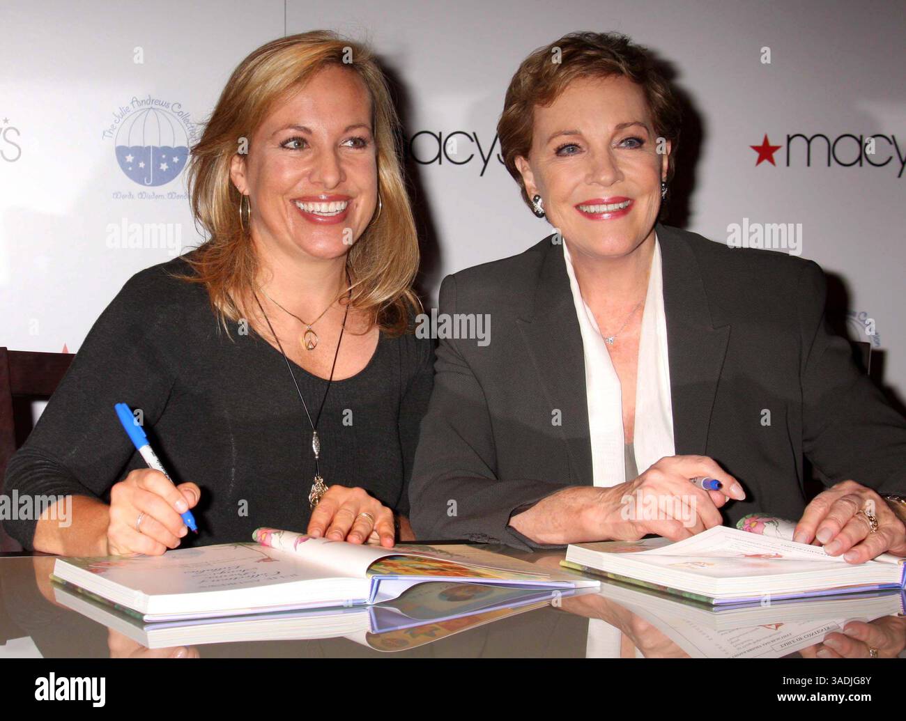 JULIE ANDREWS and coauthor/daughter EMMA WALTON HAMILTON signing their
