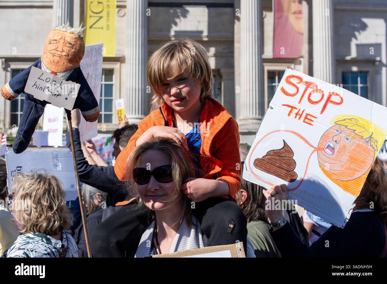 Protest Puppet London, UK. 05th Apr, 2025. Protesters pose for a photo with their ...