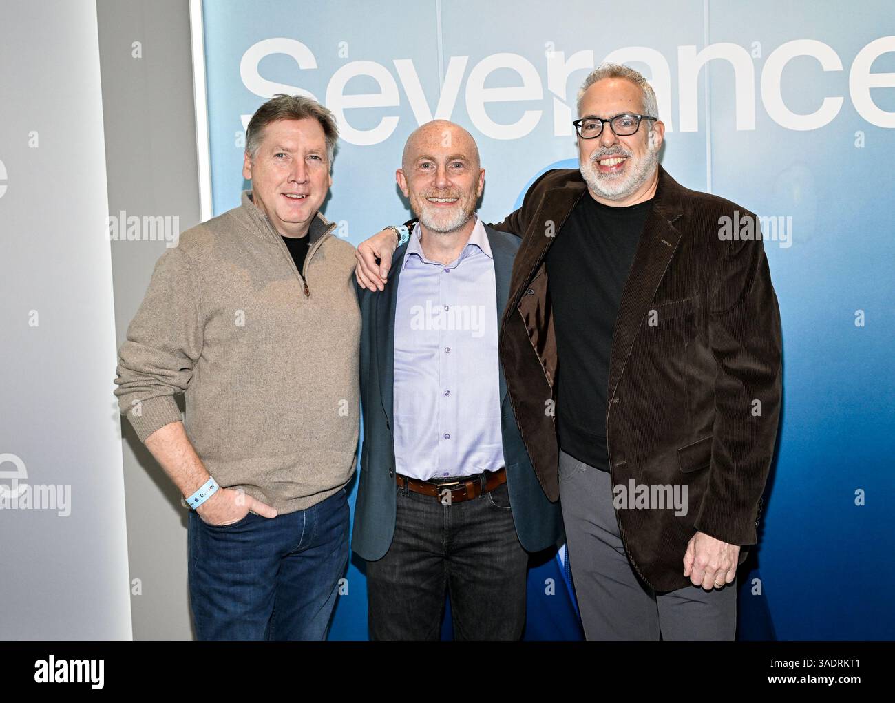 Bob Chefalas, left, Geoffrey Richman and Jacob Ribicoff from Apple TV+ ...