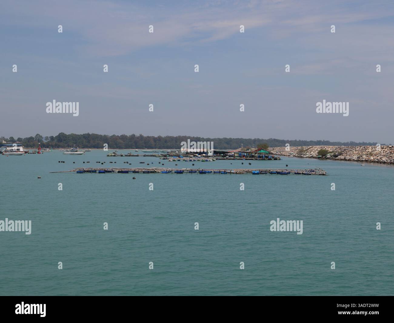 A beautiful and scenic waterway featuring floating structures amidst ...