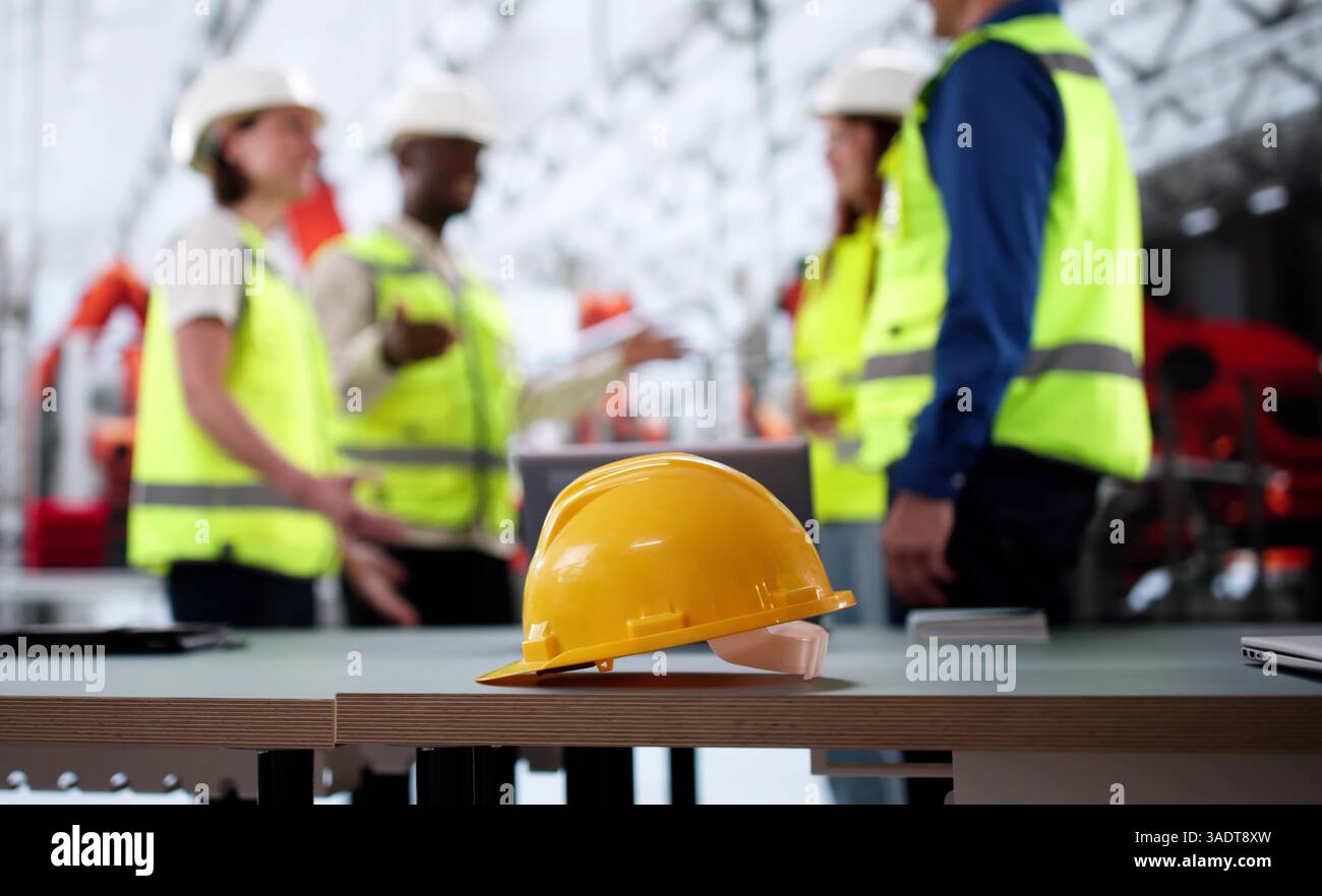Engineering Worker Wearing A Plastic Hard Hat On Industrial Job Stock Photo