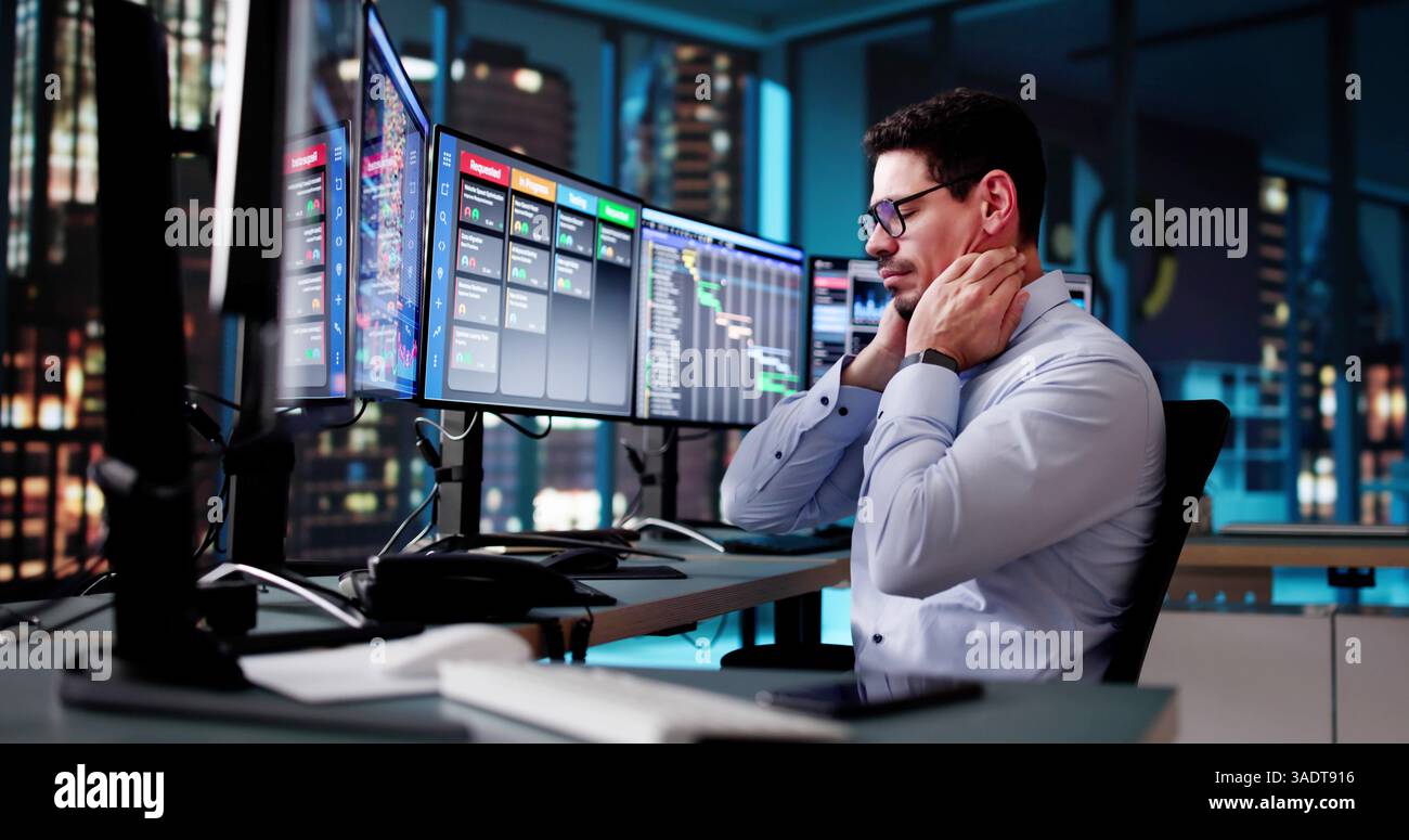 Scrum Project Manager Using Scrum Board Scheduling Software Stock Photo