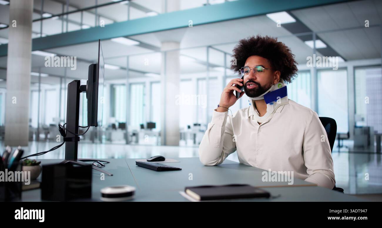 Office Worker Making Compensation Call for Broken Arm Coverage Stock Photo