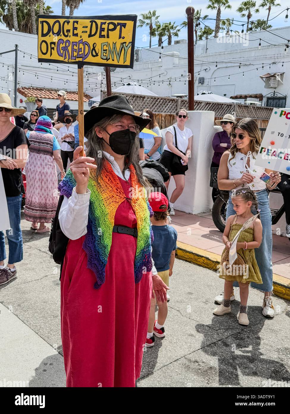 Santa Barbara, Ca, USA. 5th Apr, 2025. Doge-Dept of Greed and Envy'' -sign during Hands Off Anti-Trump Admin Rally on April 5, 2025 at De La Guerra Plaza''” the largest protest in Santa Barbara modern history. (Credit Image: © Amy Katz/ZUMA Press Wire) EDITORIAL USAGE ONLY! Not for Commercial USAGE! Stock Photo