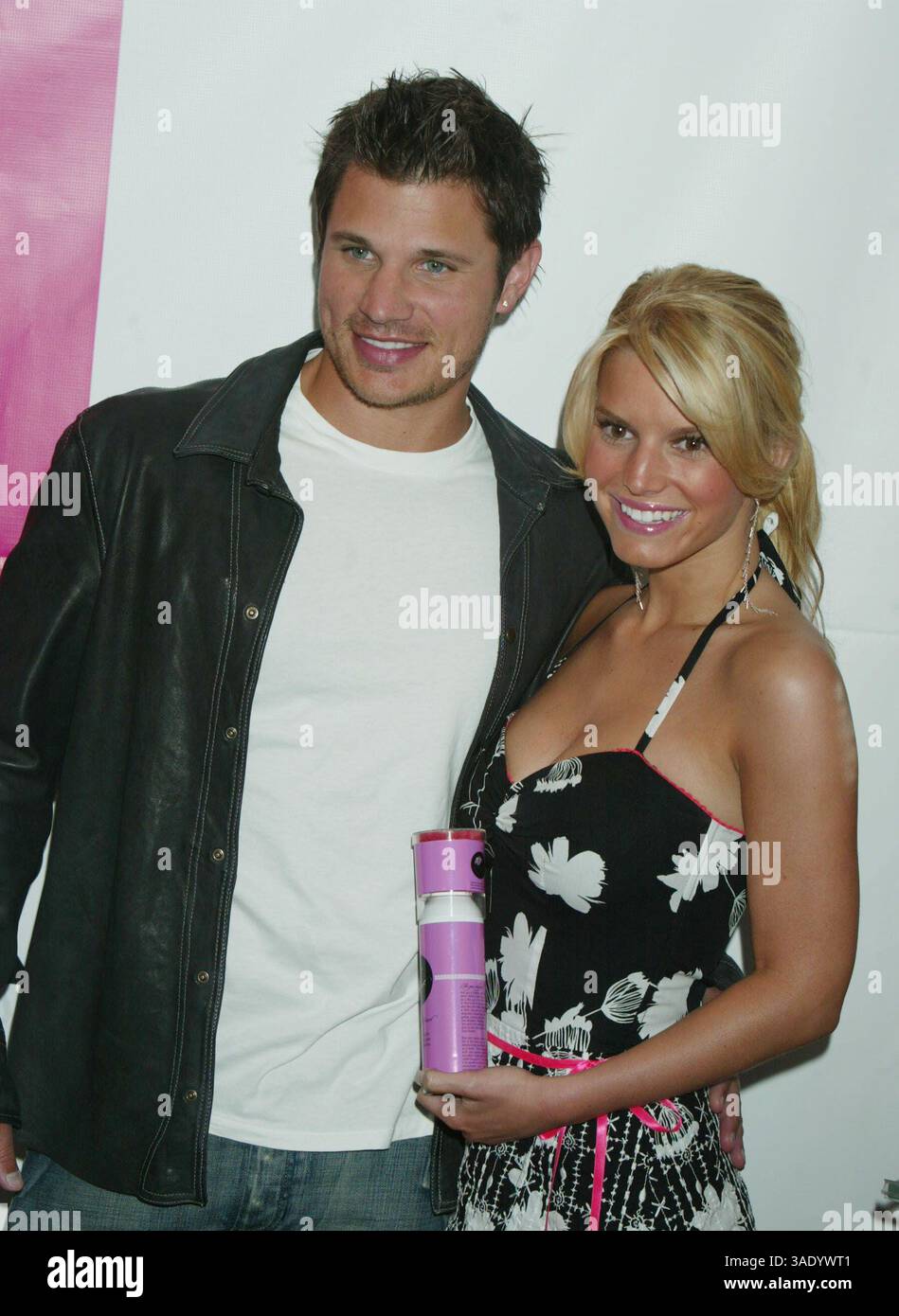 Apr 24, 2004; New York, NY, USA; Singer NICK LACHEY & his wife/singer JESSICA SIMPSON celebrate the launch of 'Dessert Beauty' at Sephora Times Square..  (Credit Image: Nancy Kaszerman/ZUMAPRESS.com) Stock Photo