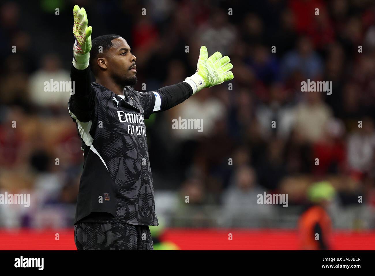 Mike Maignan of Ac Milan gestures during the Serie A football match ...