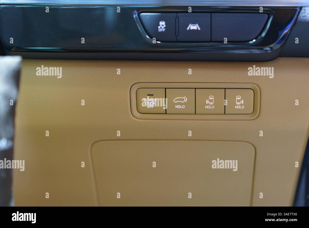 detailed look at power door off, trunk hold, and hold buttons on a sleek interior panel, showcasing convenience and modern automotive design. Stock Photo