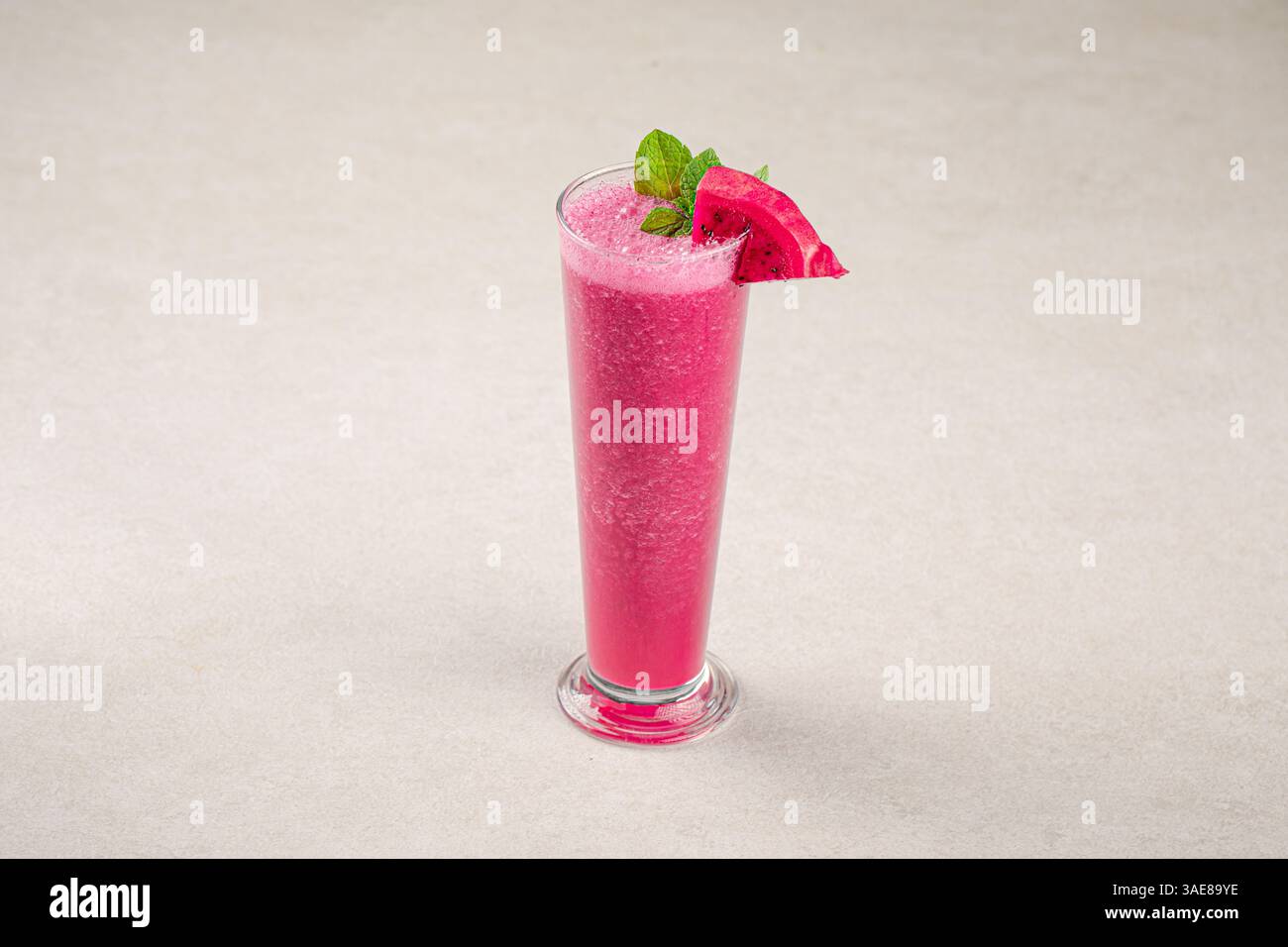 Glass of dragon fruit pitahaya smoothie with mint Stock Photo - Alamy