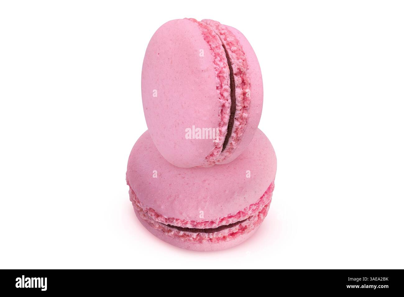 Pink macarons on isolated white background. Stock Photo