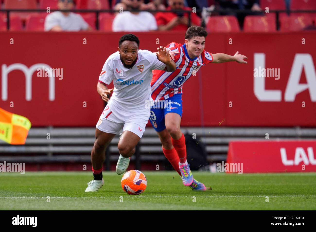 Chidera Ejuke of Sevilla FC and Julian Alvarez of Atletico de Madrid in  action during the Spanish League, LaLiga EA Sports, football match played  between Sevilla FC and Atletico de Madrid at