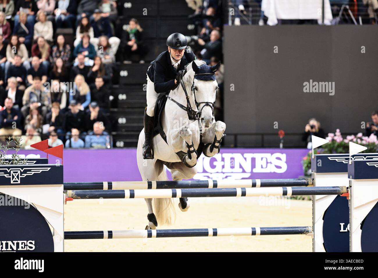 Ales OPATRNY of Czech Republic with Kapsones W. during the Longines FEI ...