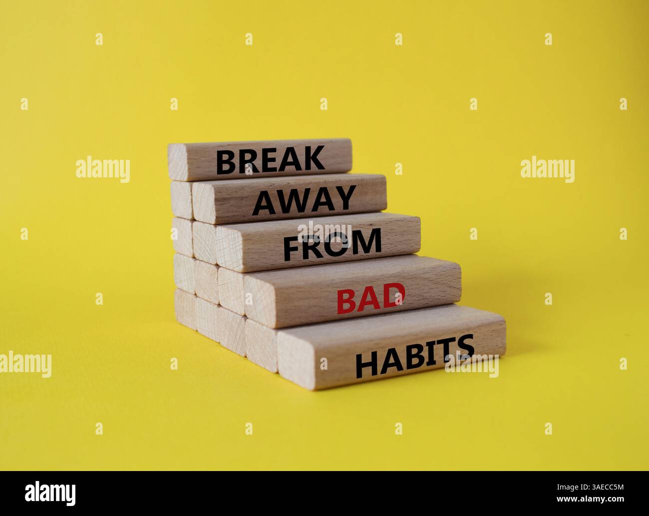 Break away from bad habits symbol. Wooden blocks with words Break away ...