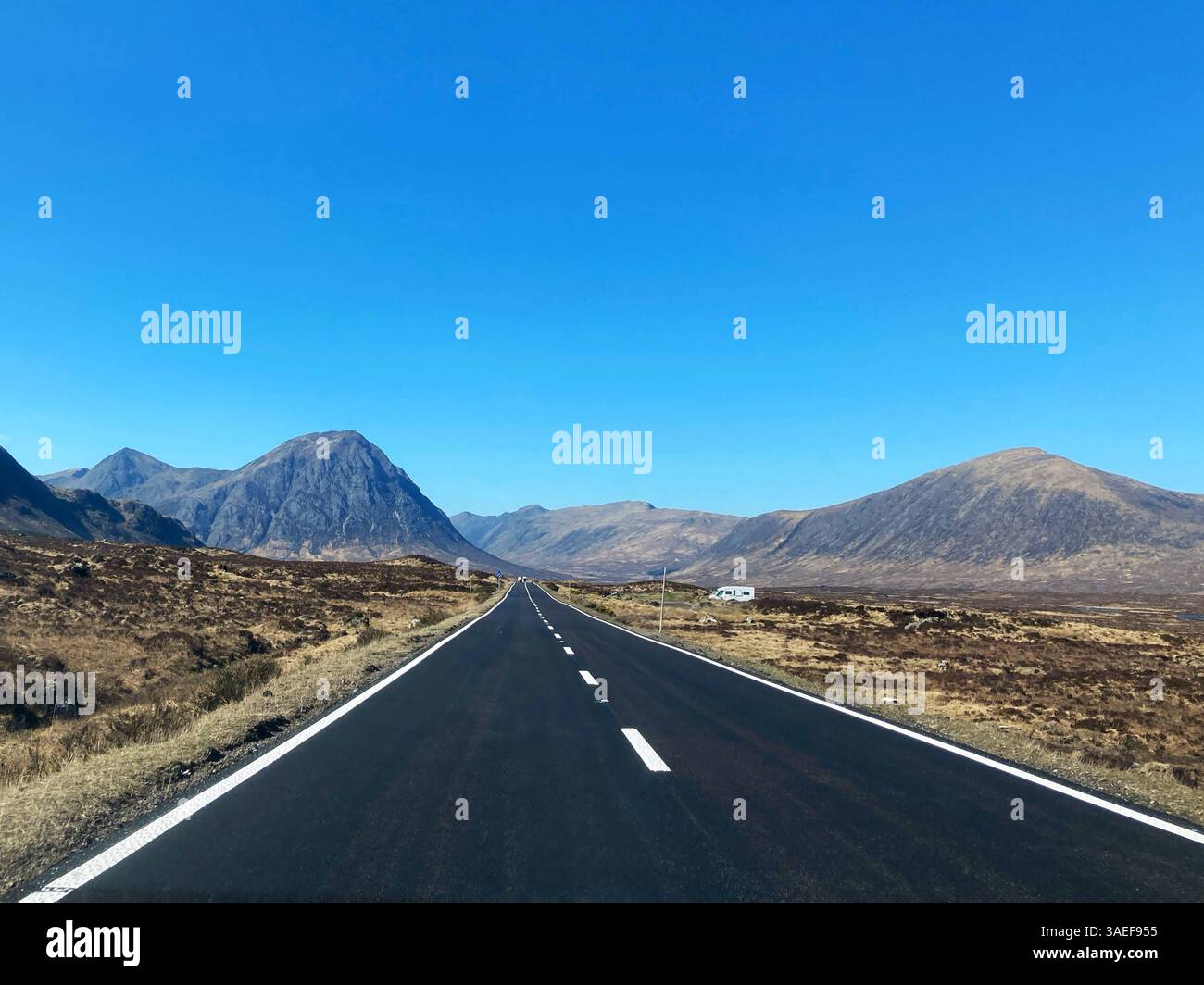 Looking along the A82 Road as it crosses Rannoch Moor, with a view of the iconic Scottish mountain Buachaille Etive Mor, Scotland - Smartphone Captured Stock Image
