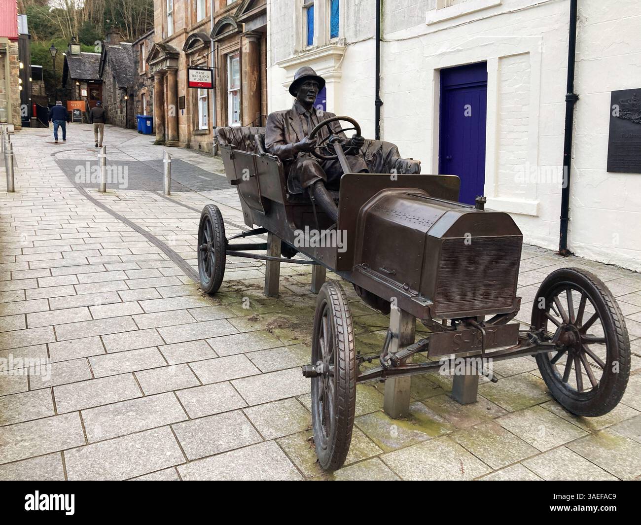 The Bronze Ford sculpture commemorates the ascent of Ben Nevis by Henry Alexander in a Model T. Ford in 1911, Fort William, Scotland - Smartphone Captured Stock Image