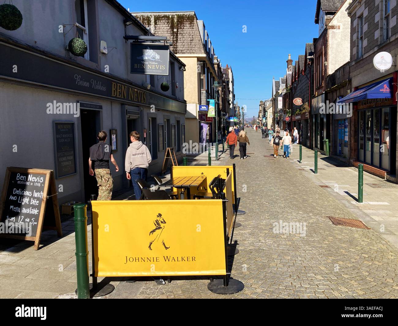 Ben Nevis pub and shops on Fort William High Street, Fort William Scotland - Smartphone Captured Stock Image