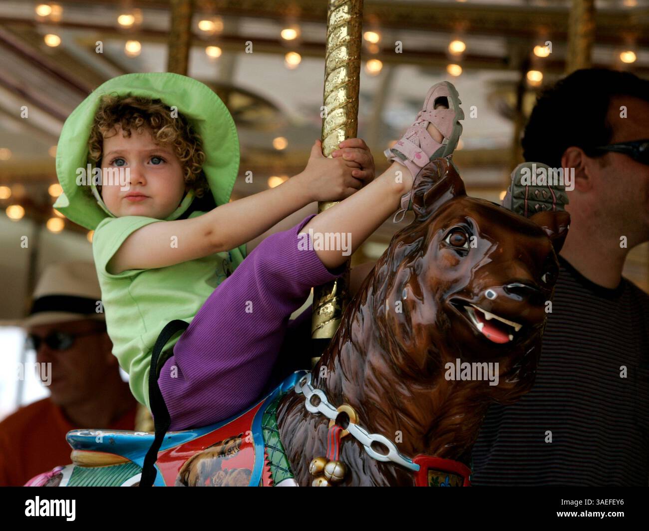 June 14, 2008, Del Mar, California ANNA OPALSAY of San Diego, rides the merry-go-round in ''Kiddie Land'' on the first day of the San Diego County Fair at the Del Mar Fairgrounds on Saturday.  (Credit Image: San Diego Union-Tribune/ZUMAPRESS.com) Stock Photo