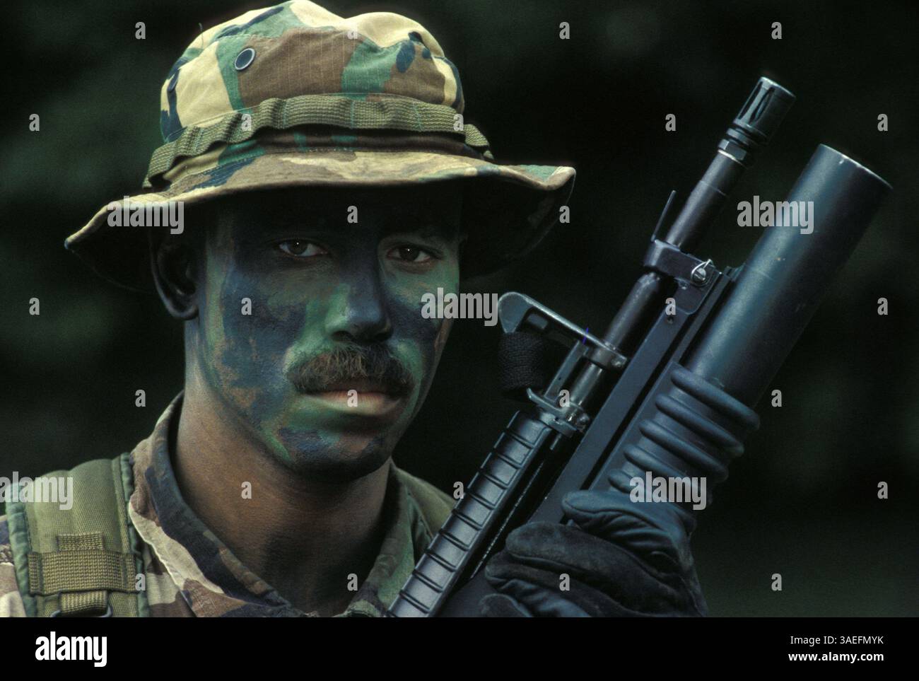 Jul 16, 2004; Fort Dix, NJ, USA; (FILE PHOTO) US Military, Navy, Spec Ops, Camoflage, Rank, Ranks, Hat, Uniform, Weapon, Rifle, MIG-A2, Grenade Launcher..  (Credit Image: Leif Skoogfors/ZUMAPRESS.com) Stock Photo