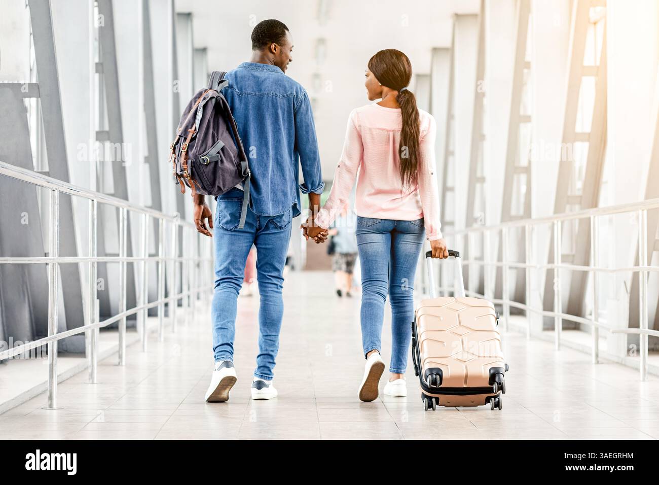 Romantic Black Couple Walking With Suitcases In Airport Terminal ...
