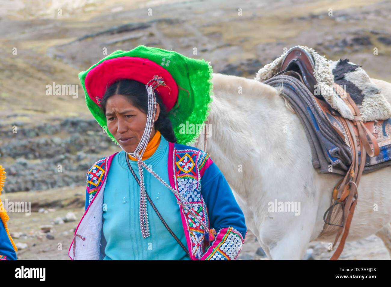 Peruvian Ride Peruvian people with horses offering tourists ride to the top of ...