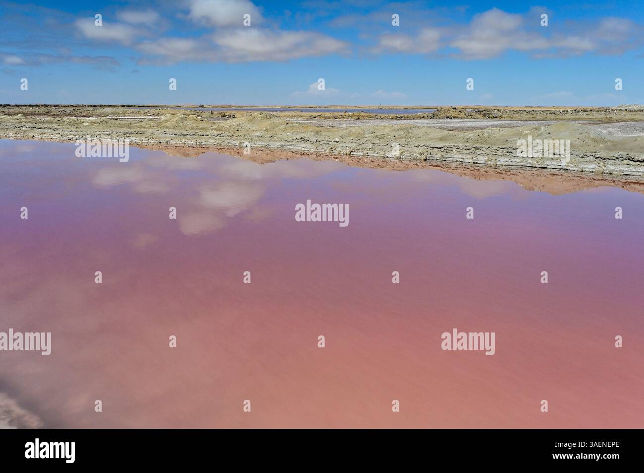 Aerial view of the striking red salt pans near Walvis Bay, Namibia. The ...