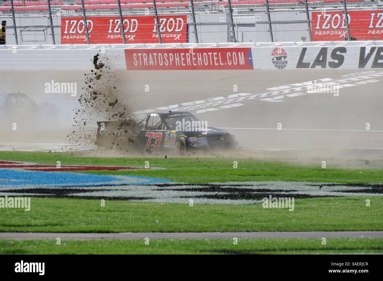 2011 OCT 15: Brent Raymer (73) Trans Pecos / County Building Centers Chevrolet chews up the infield grass while spinning out of control during the Smiths 350 NASCAR Camping World Truck Series auto race at Las Vgeas Motor Speedway in Las Vegas, NV(Credit Image: © Josh Holmberg/Cal Sport Media/ZUMAPRESS.com) Stock Photo