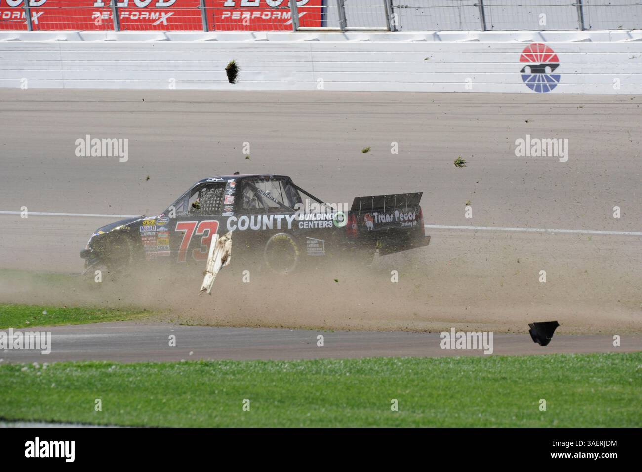 2011 OCT 15: Brent Raymer (73) Trans Pecos / County Building Centers Chevrolet chews up the infield grass while spinning out of control during the Smiths 350 NASCAR Camping World Truck Series auto race at Las Vgeas Motor Speedway in Las Vegas, NV(Credit Image: © Josh Holmberg/Cal Sport Media/ZUMAPRESS.com) Stock Photo