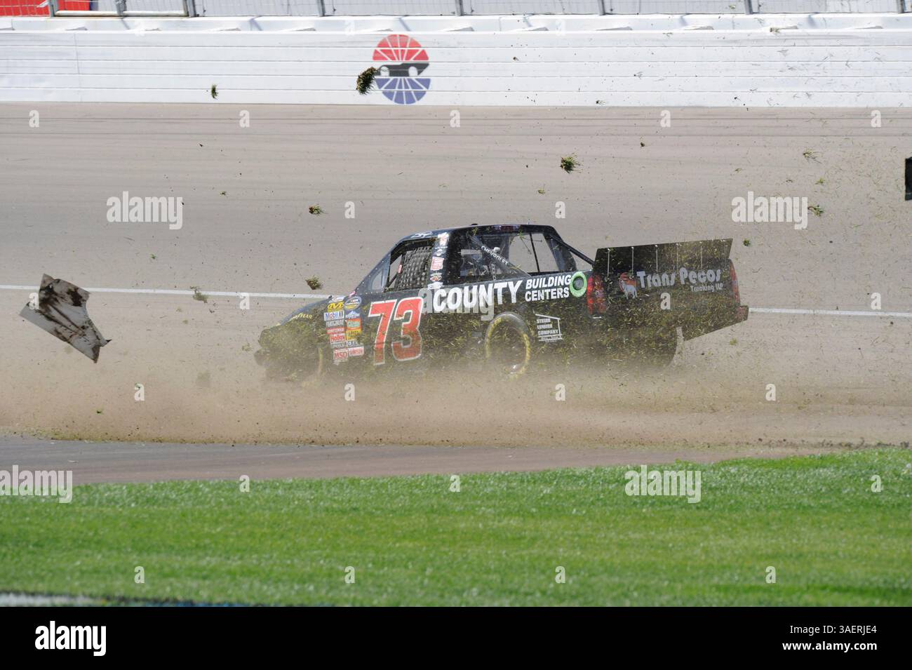 2011 OCT 15: Brent Raymer (73) Trans Pecos / County Building Centers Chevrolet chews up the infield grass while spinning out of control during the Smiths 350 NASCAR Camping World Truck Series auto race at Las Vgeas Motor Speedway in Las Vegas, NV(Credit Image: © Josh Holmberg/Cal Sport Media/ZUMAPRESS.com) Stock Photo