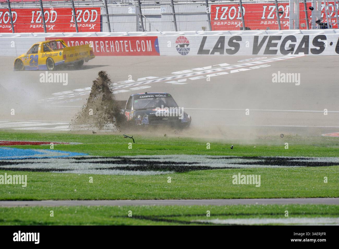 2011 OCT 15: Brent Raymer (73) Trans Pecos / County Building Centers Chevrolet chews up the infield grass while spinning out of control during the Smiths 350 NASCAR Camping World Truck Series auto race at Las Vgeas Motor Speedway in Las Vegas, NV(Credit Image: © Josh Holmberg/Cal Sport Media/ZUMAPRESS.com) Stock Photo