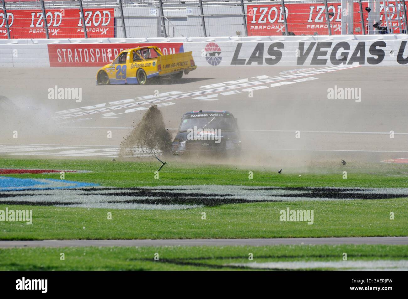 2011 OCT 15: Brent Raymer (73) Trans Pecos / County Building Centers Chevrolet chews up the infield grass while spinning out of control during the Smiths 350 NASCAR Camping World Truck Series auto race at Las Vgeas Motor Speedway in Las Vegas, NV(Credit Image: © Josh Holmberg/Cal Sport Media/ZUMAPRESS.com) Stock Photo