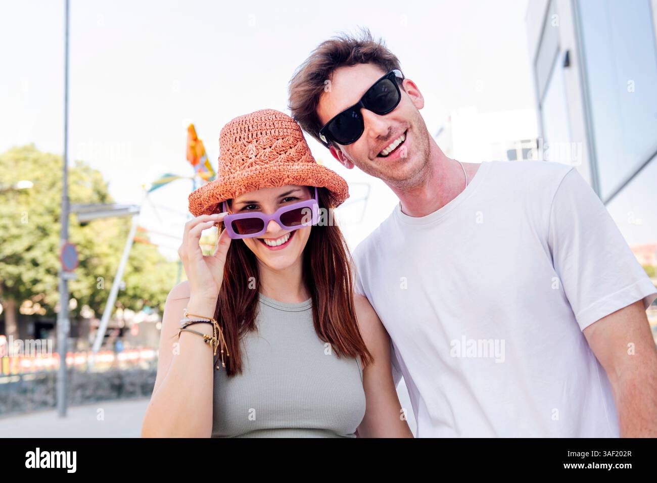 young couple smiling happy looking at camera Stock Photo