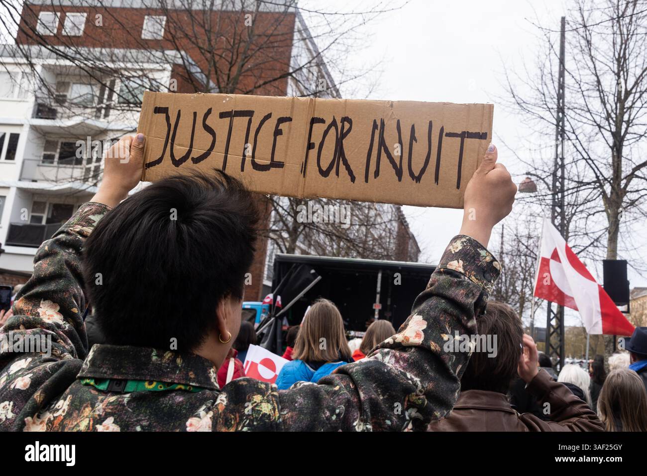 A protester holds a placard that reads “JUSTICE FOR INUIT” during a ...
