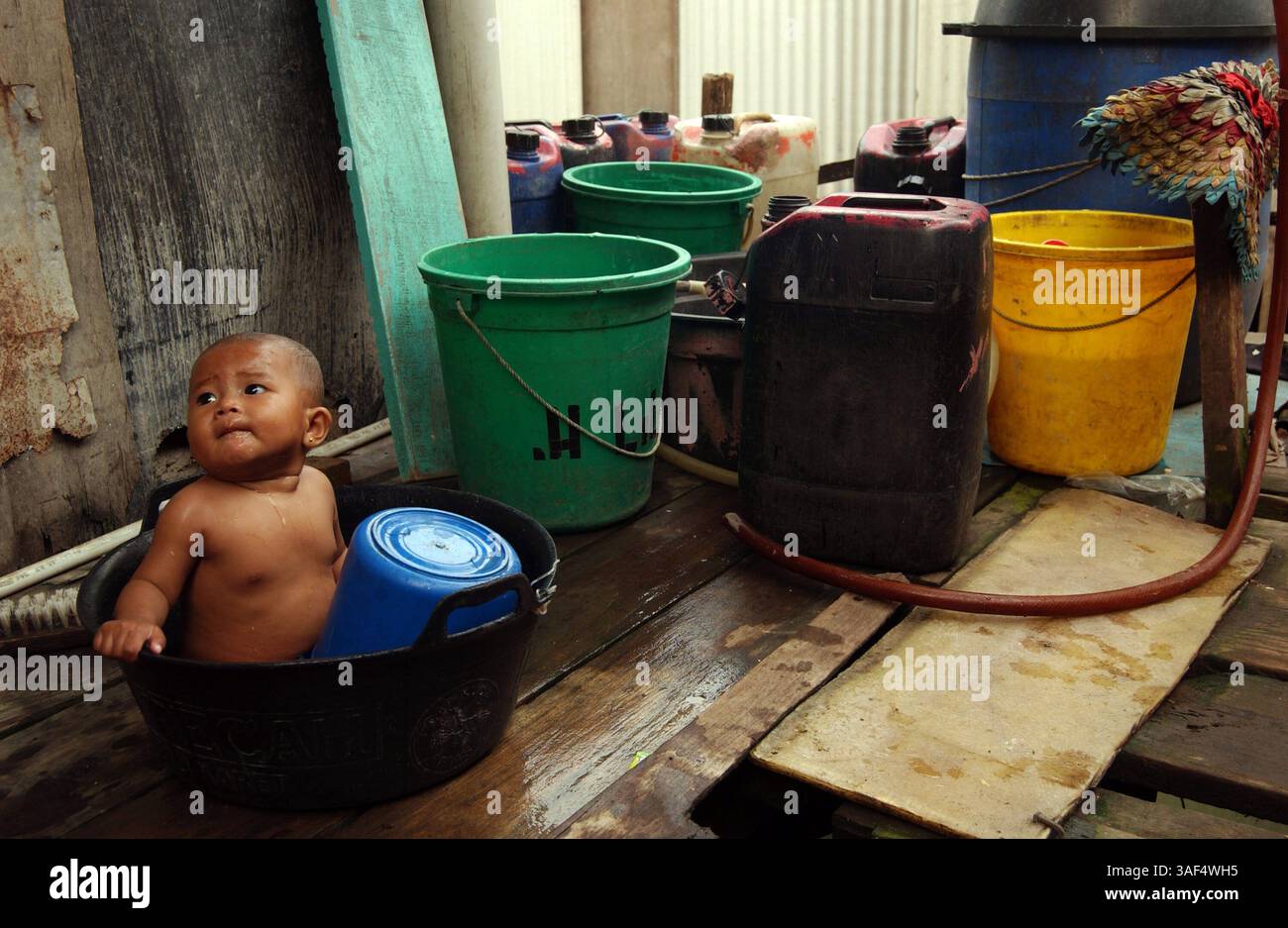 Jakarta heavily polluted river hi-res stock photography and images - Alamy