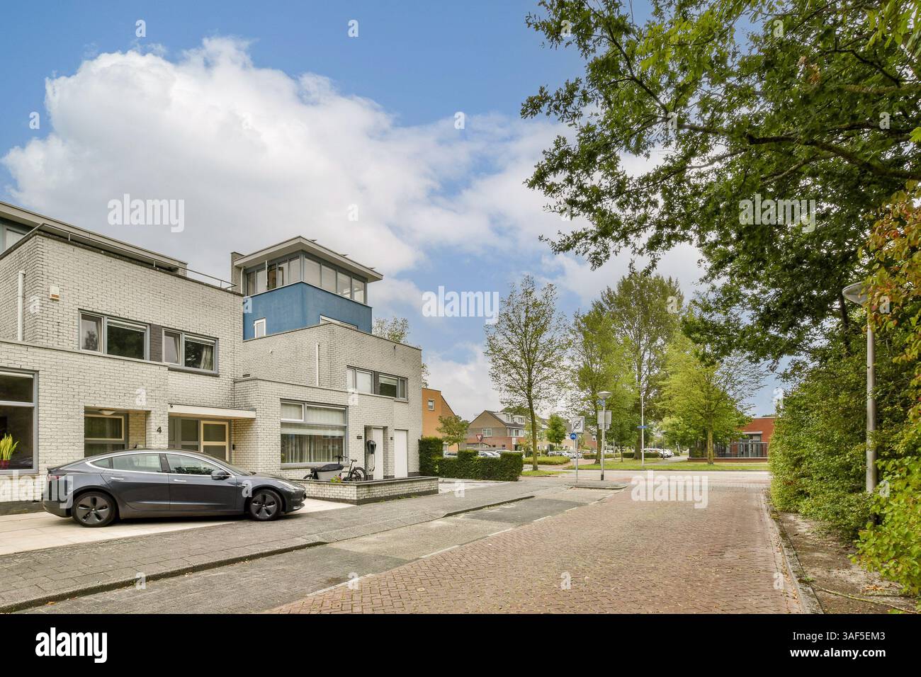 A contemporary residential structure featuring large windows ...