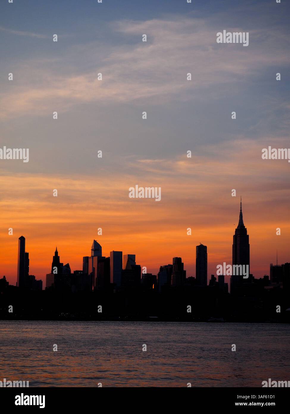 Manhattan Skyline at Sunset from Williamsburg Stock Photo