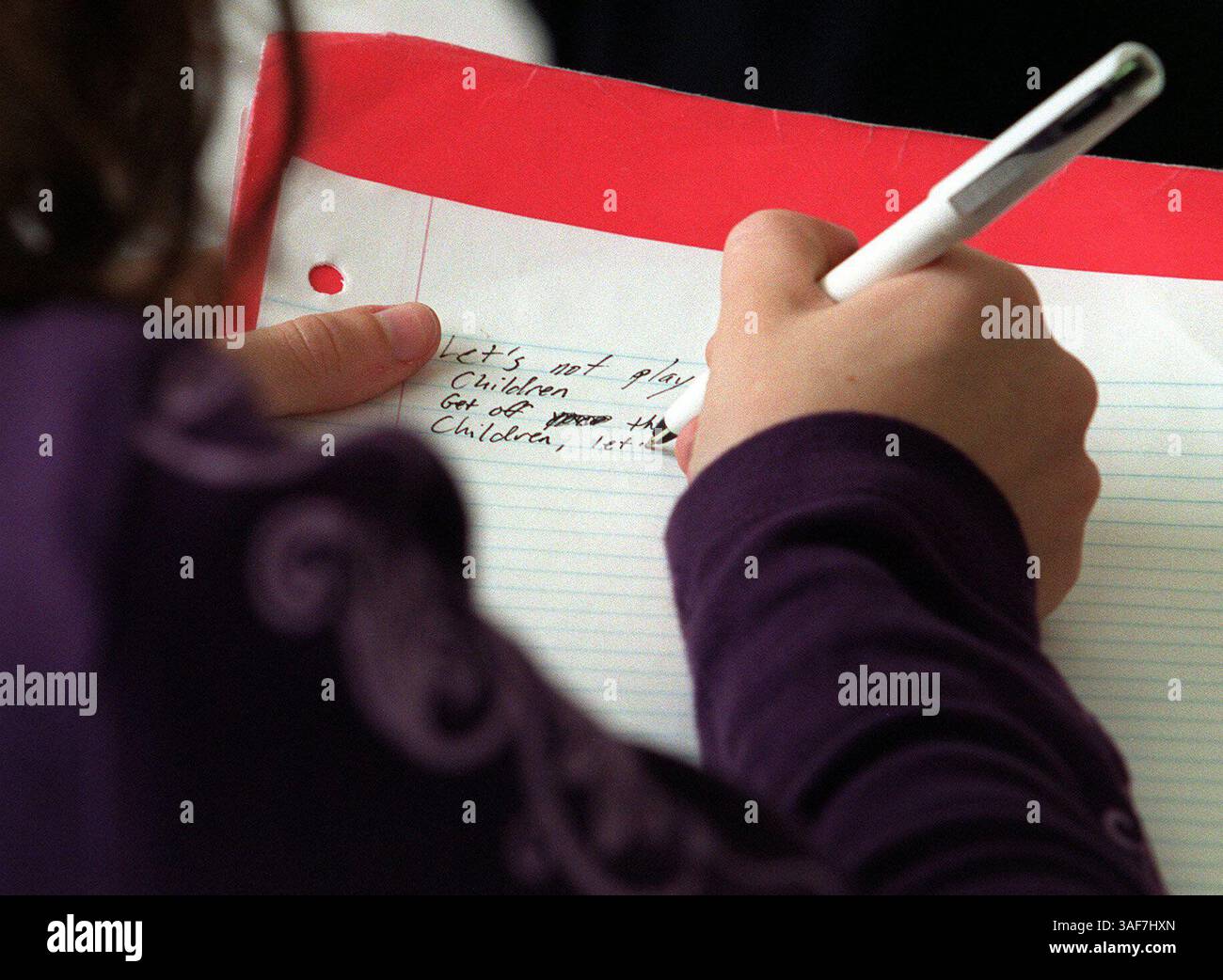 CW.101174.- - DELIVER TO:.North of Tampa.- -.3/16/2000.- -.Hillsborough County.- -.CAPTION INFO:.2. Deena Westbrook (cq) composes a poem during the meeting that she then read..Info from the photo request: Feature on Dead Poets Society group at Sickles High School. The students meet to read poetry and talk about poems. Story is for North of Tampa neighborhood report..- -.Times Photo-.Thomas M. Goethe.- -.Story By:.Gazella (Credit Image: St Petersburg Times/ZUMAPRESS.com) Stock Photo